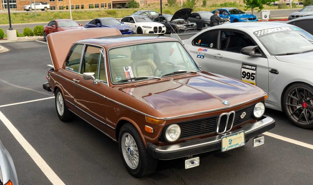 bmw 2002 at a car show