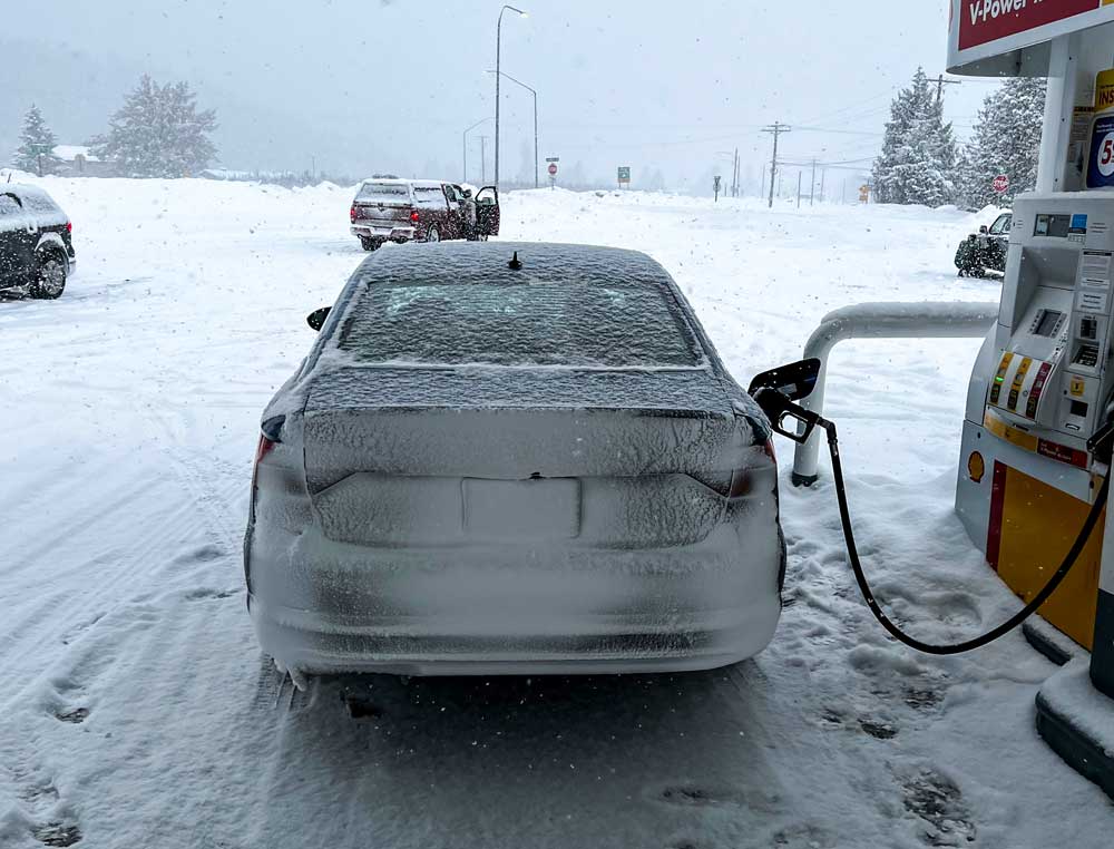 filling up the car before testing blizzak ws90 tires in heavy snow