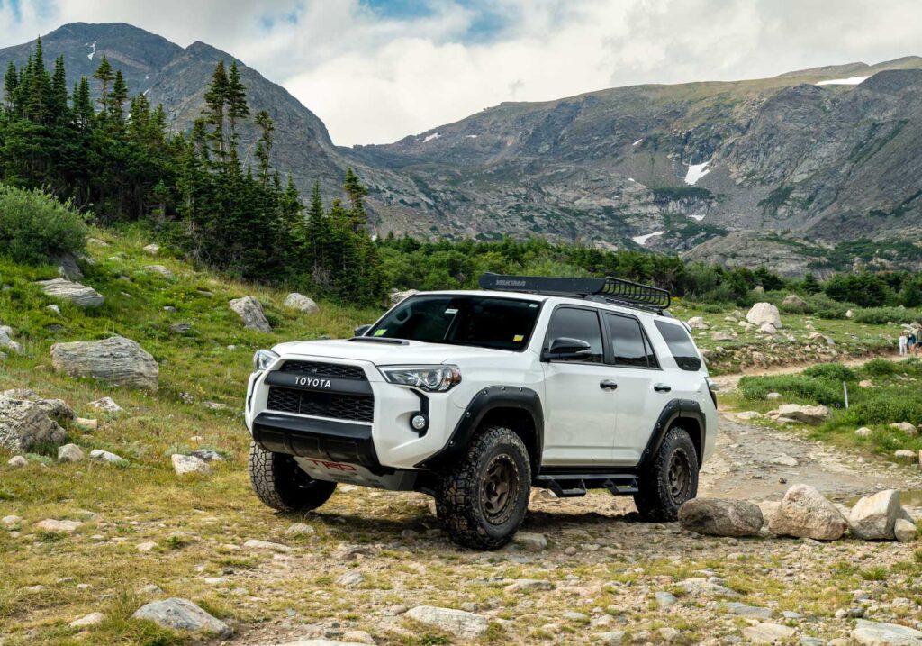toyota 4runner with falken wildpeak at4w tires being tested on rocky off-road terrain